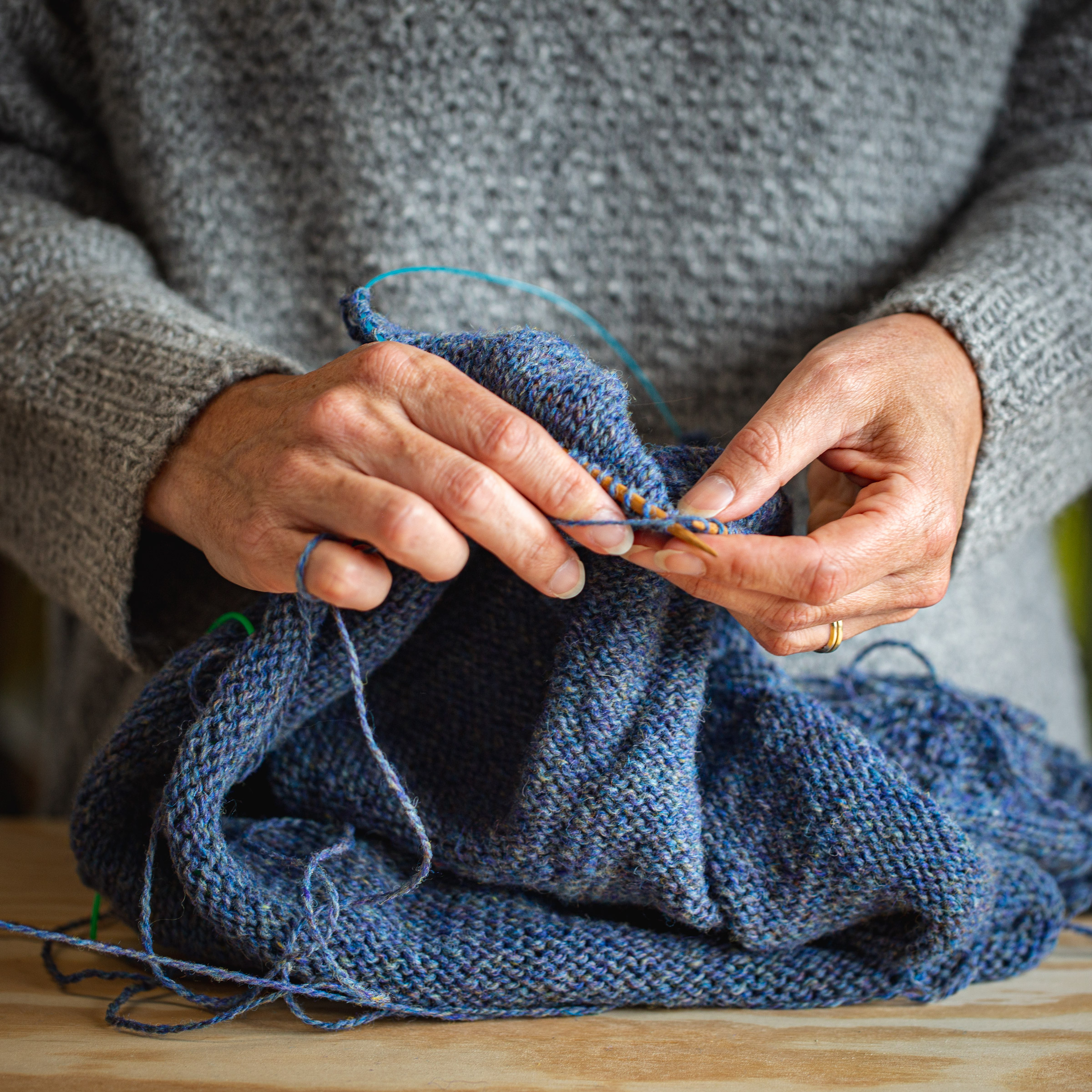 Hands knitting garment
