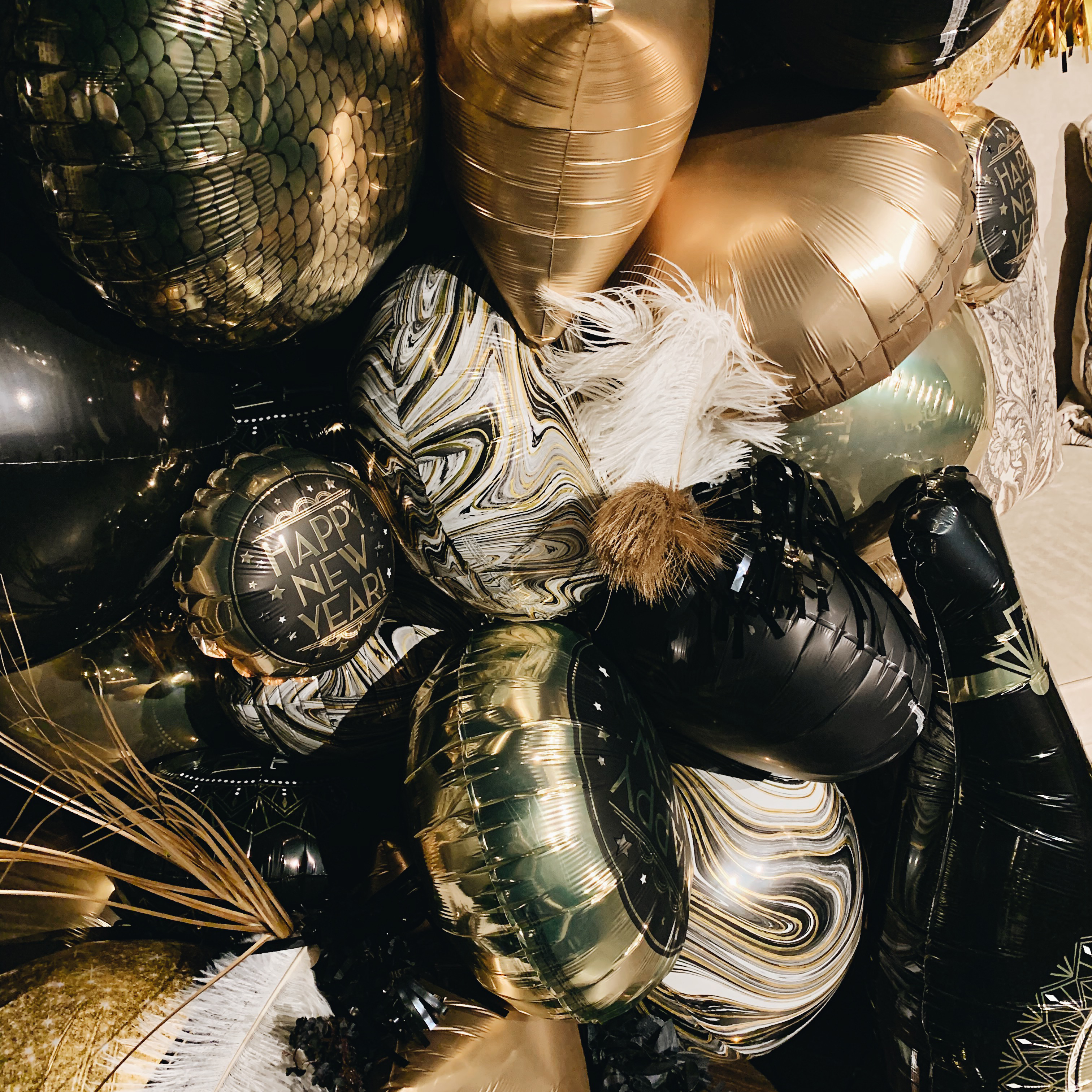 Black, gold, silver, marbled balloons