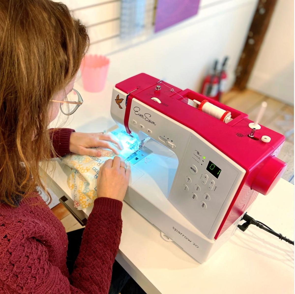 Person at a sewing machine