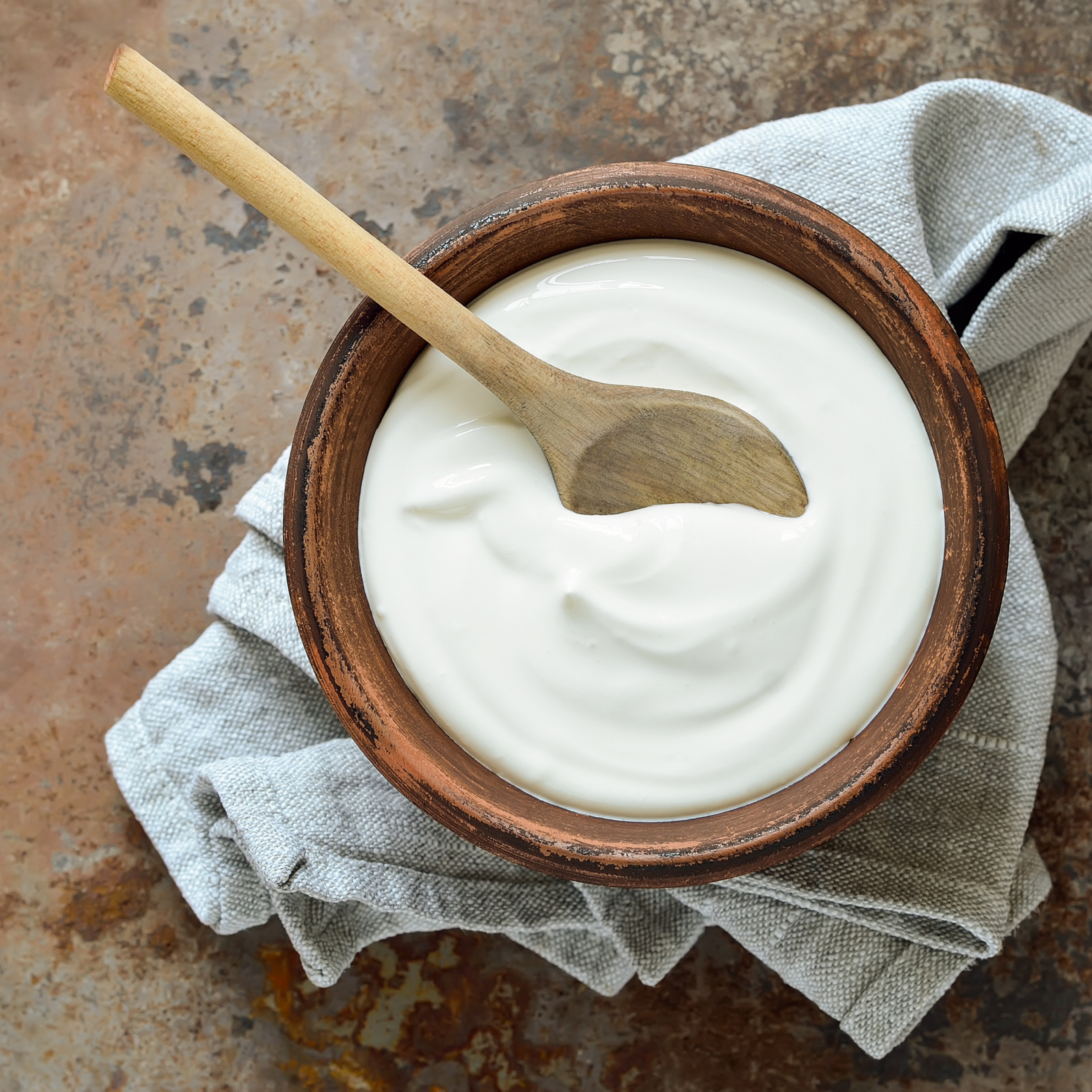 Fresh yogurt in a bowl for a spring cleanse intestinal rejuvenation