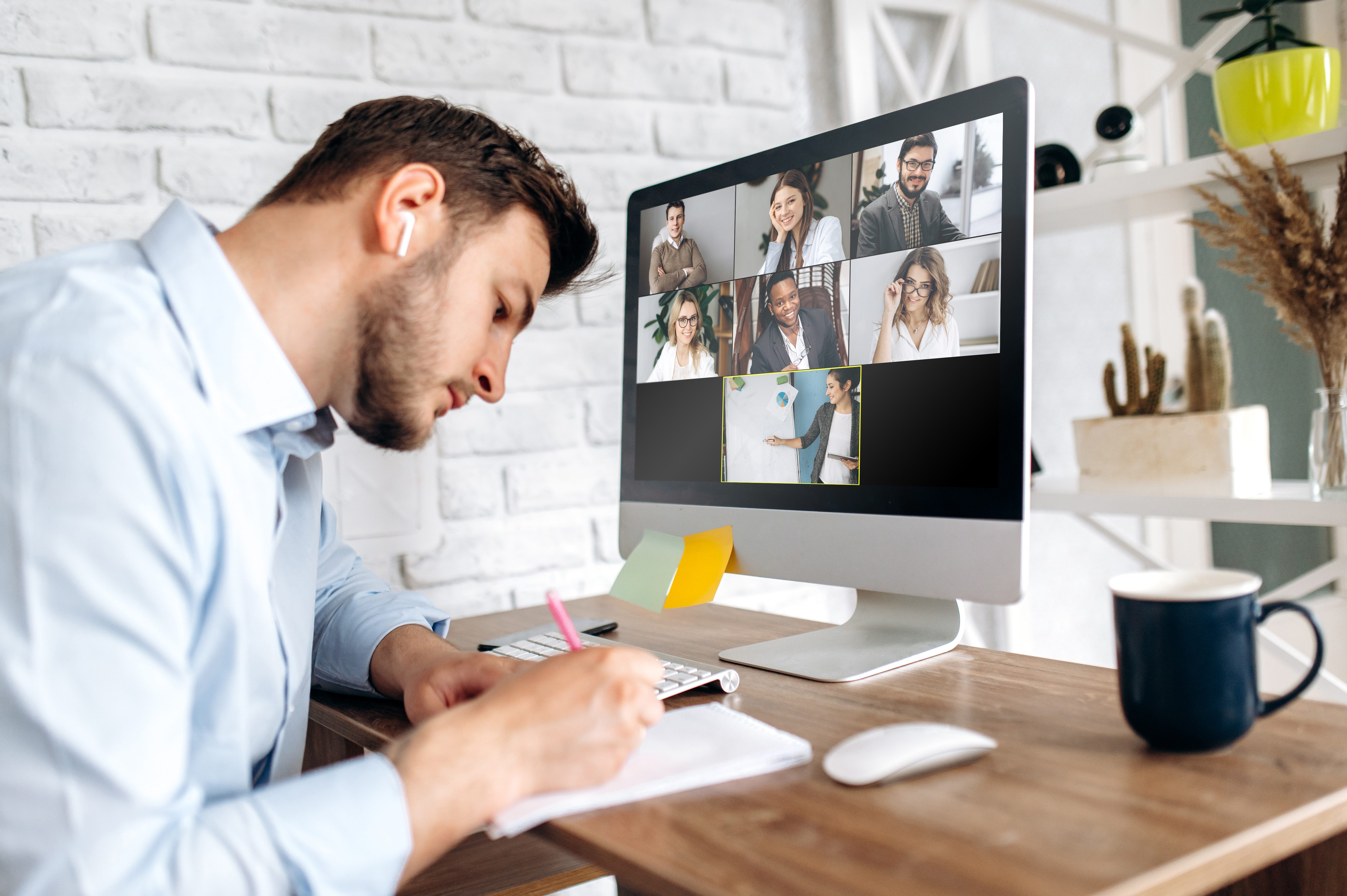 Man working at computer desk