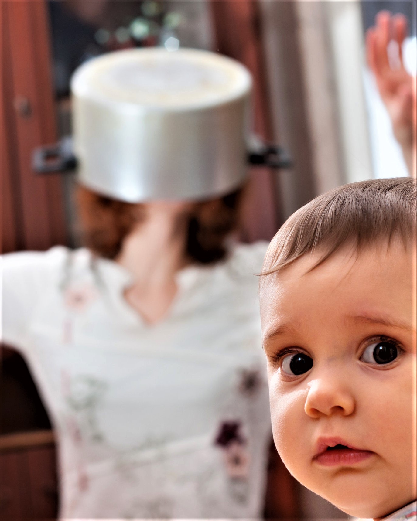 Mom with pot on head with worried child