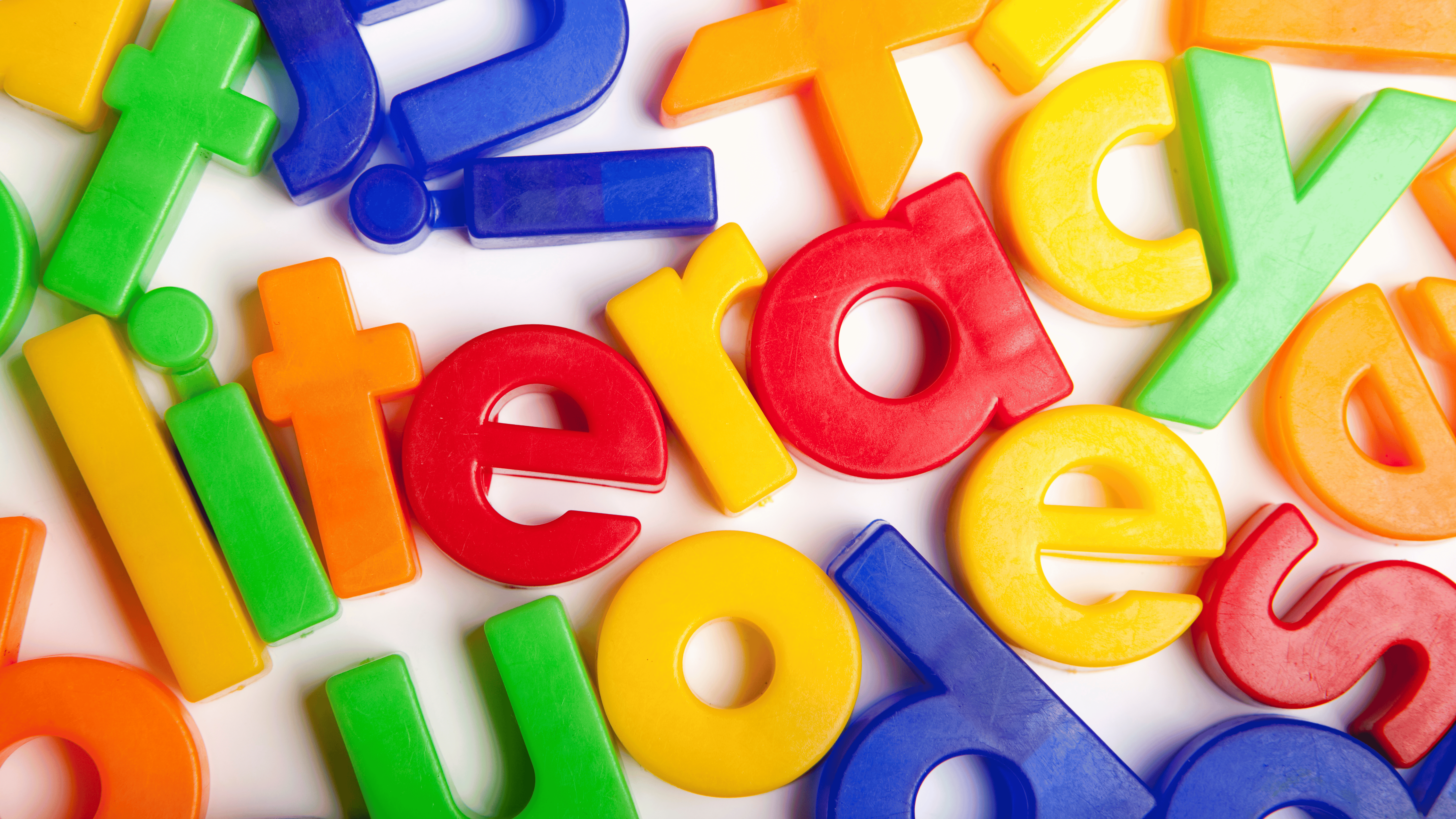 the word literacy spelled out of magnet letters