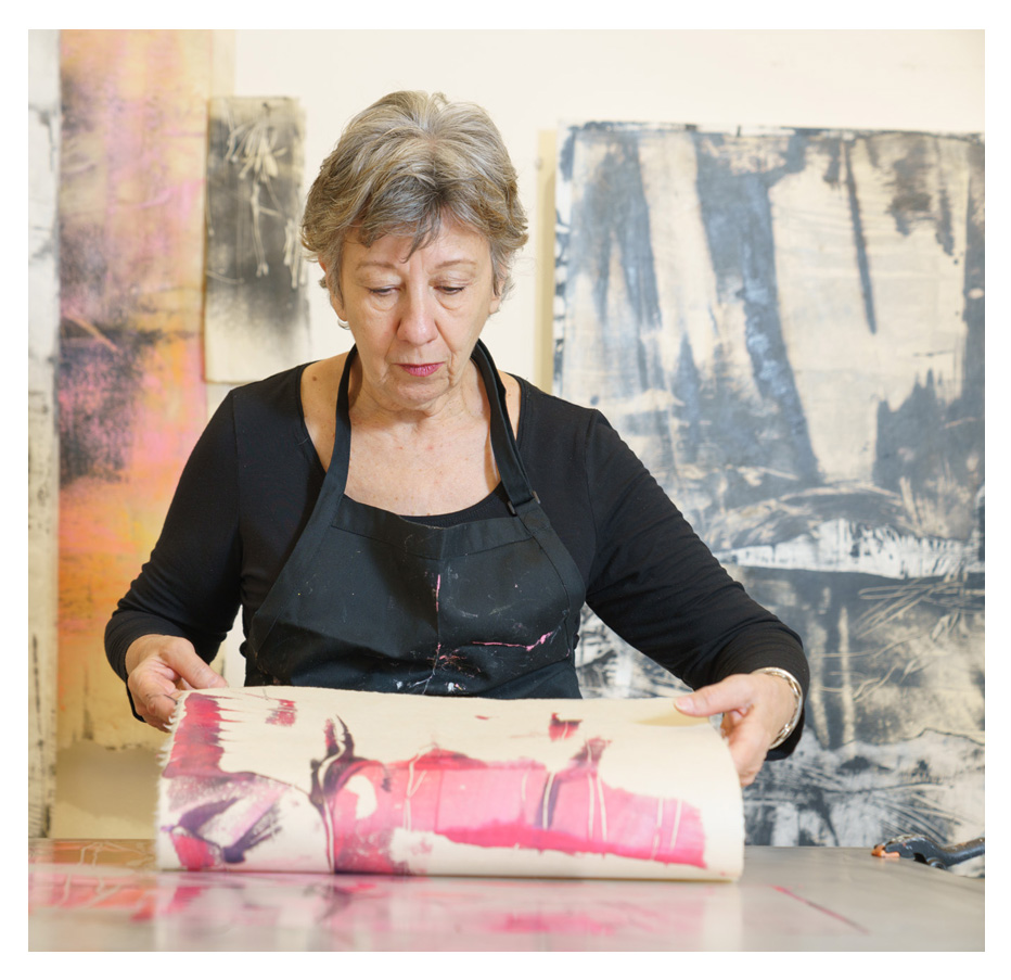 Paula Roland making an encaustic monotype 