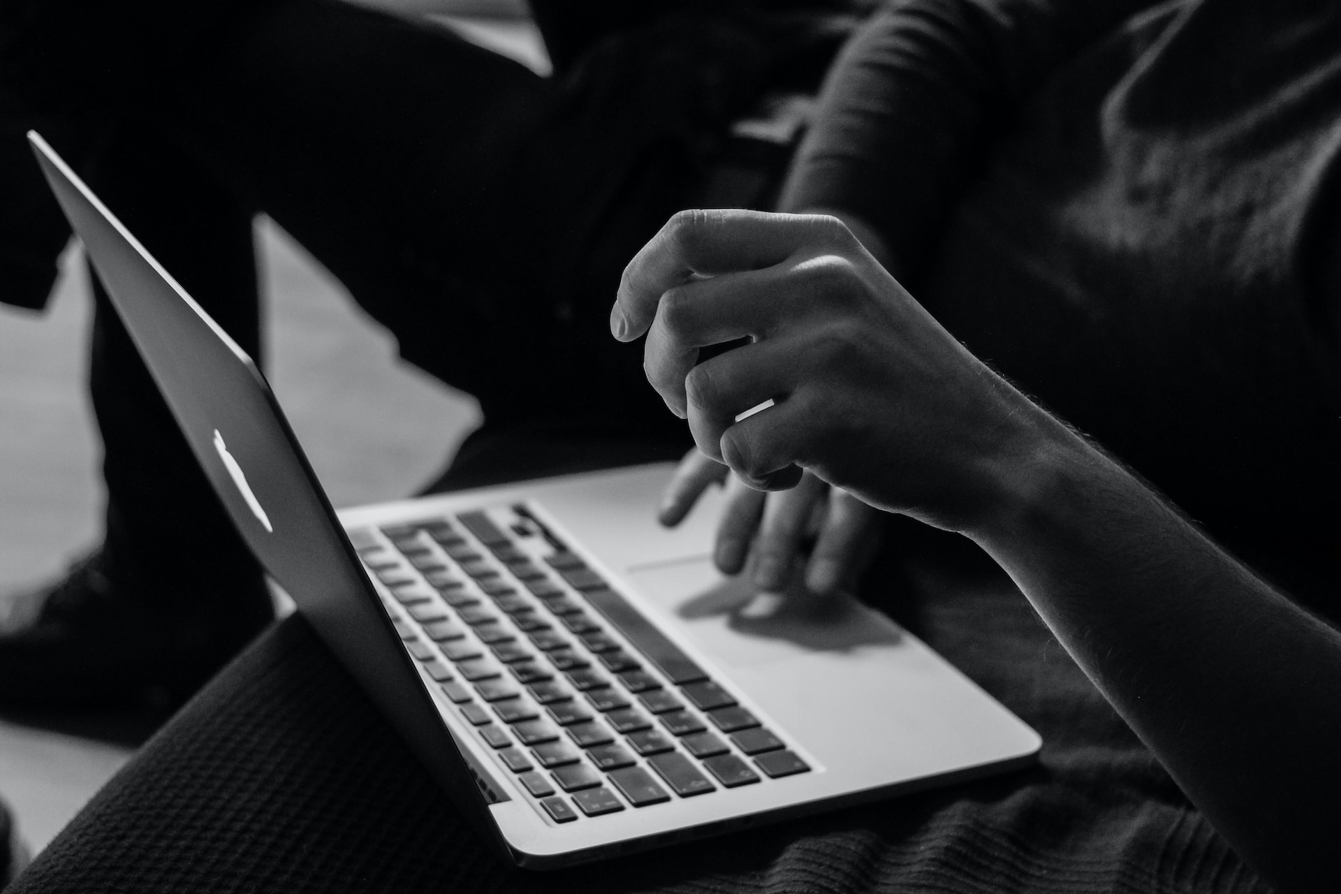 Picture of a user typing on a Macbook Pro