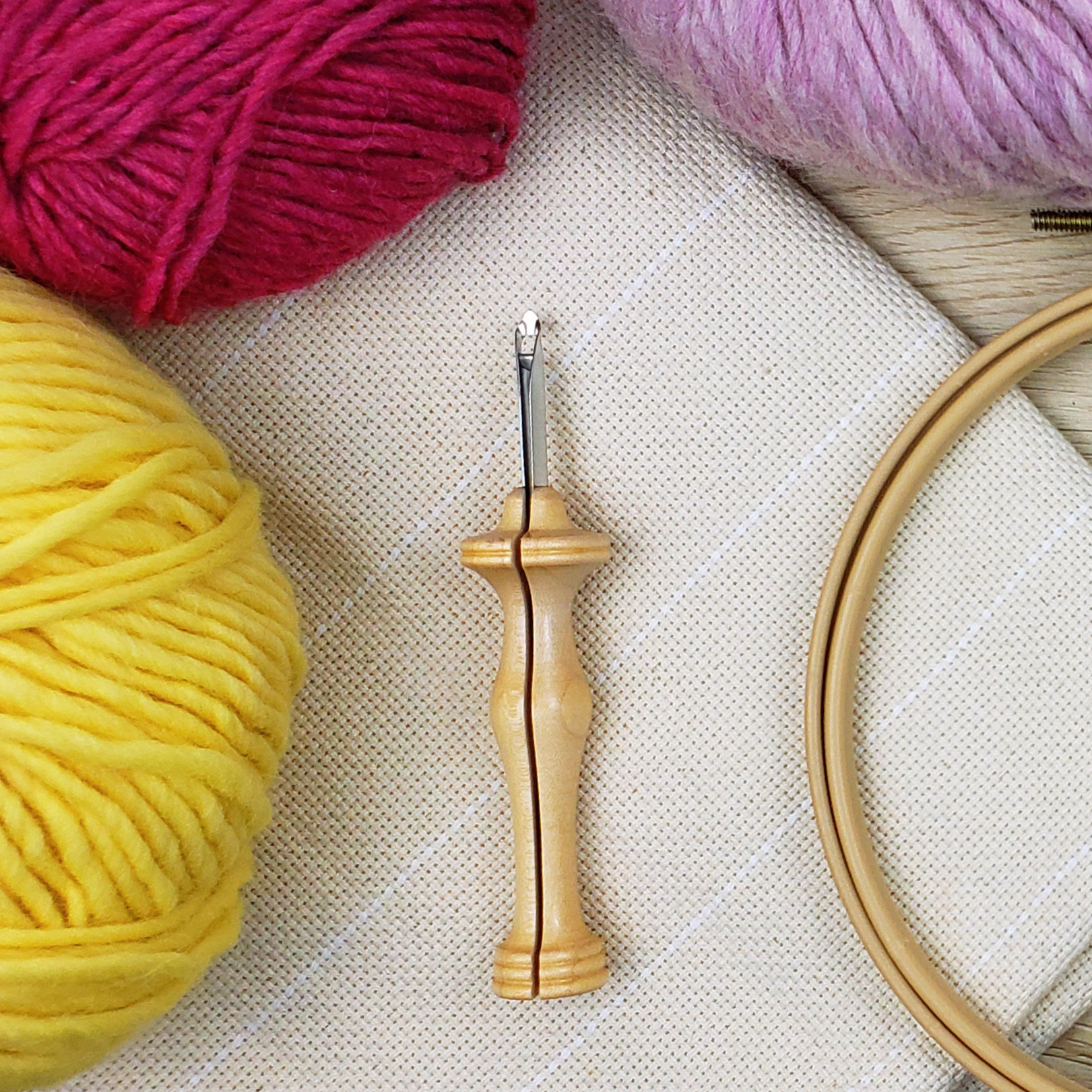 Oxford punch needle, yarn, embroidery hoop, and monk's cloth