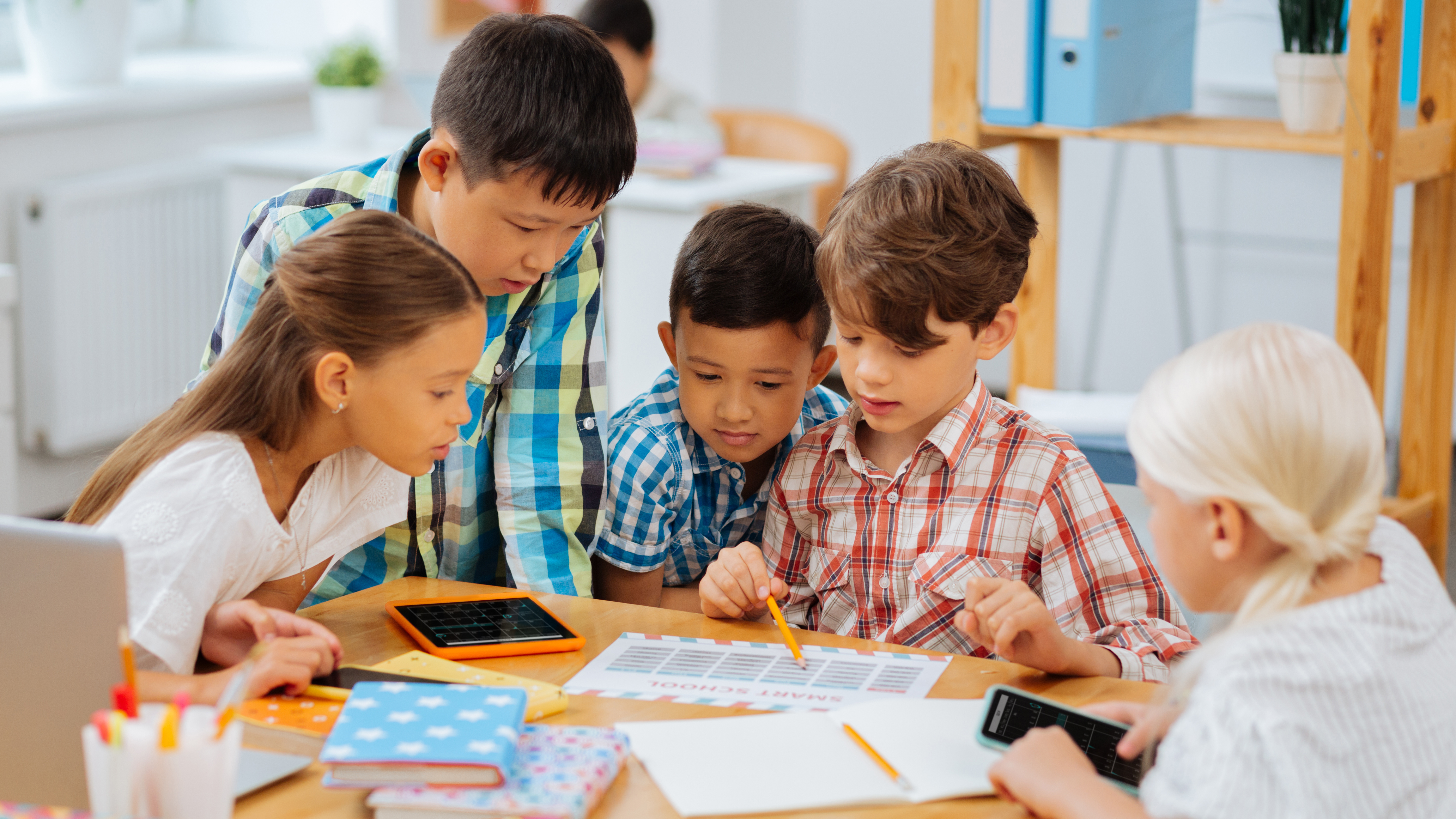 students working together around a table