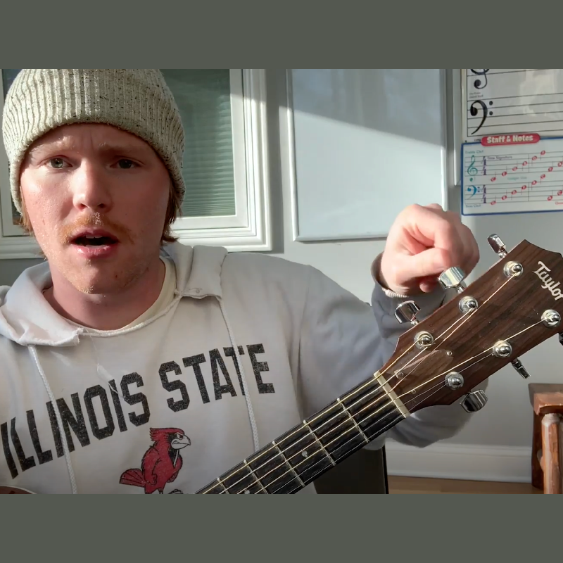 Ben demonstrating the tuning pegs.