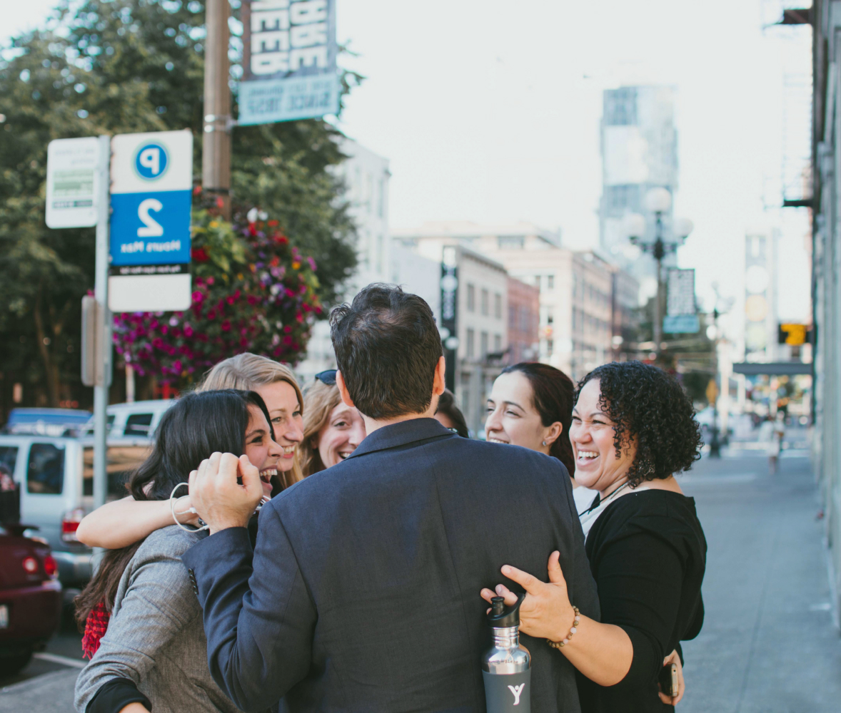 Group of people huddling