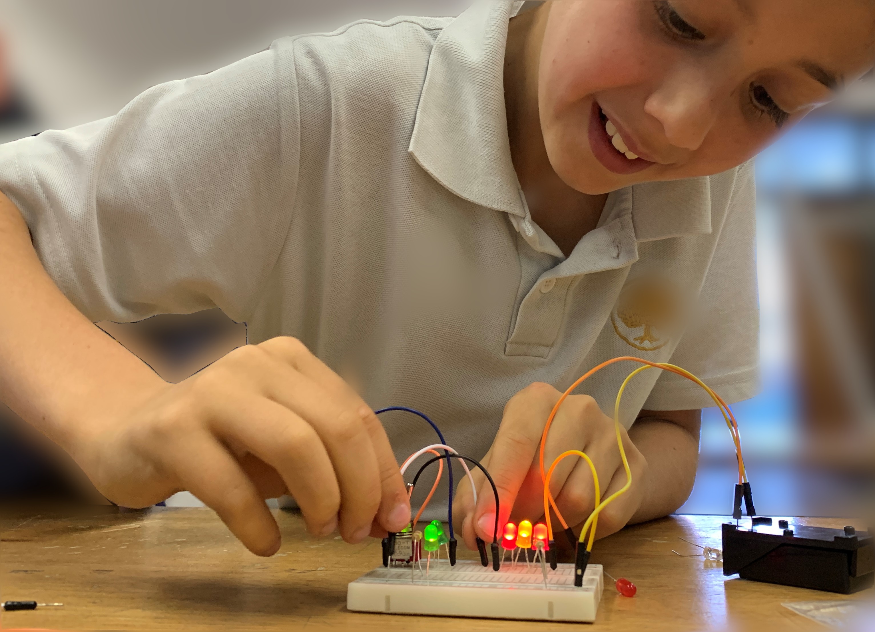 boy building circuits