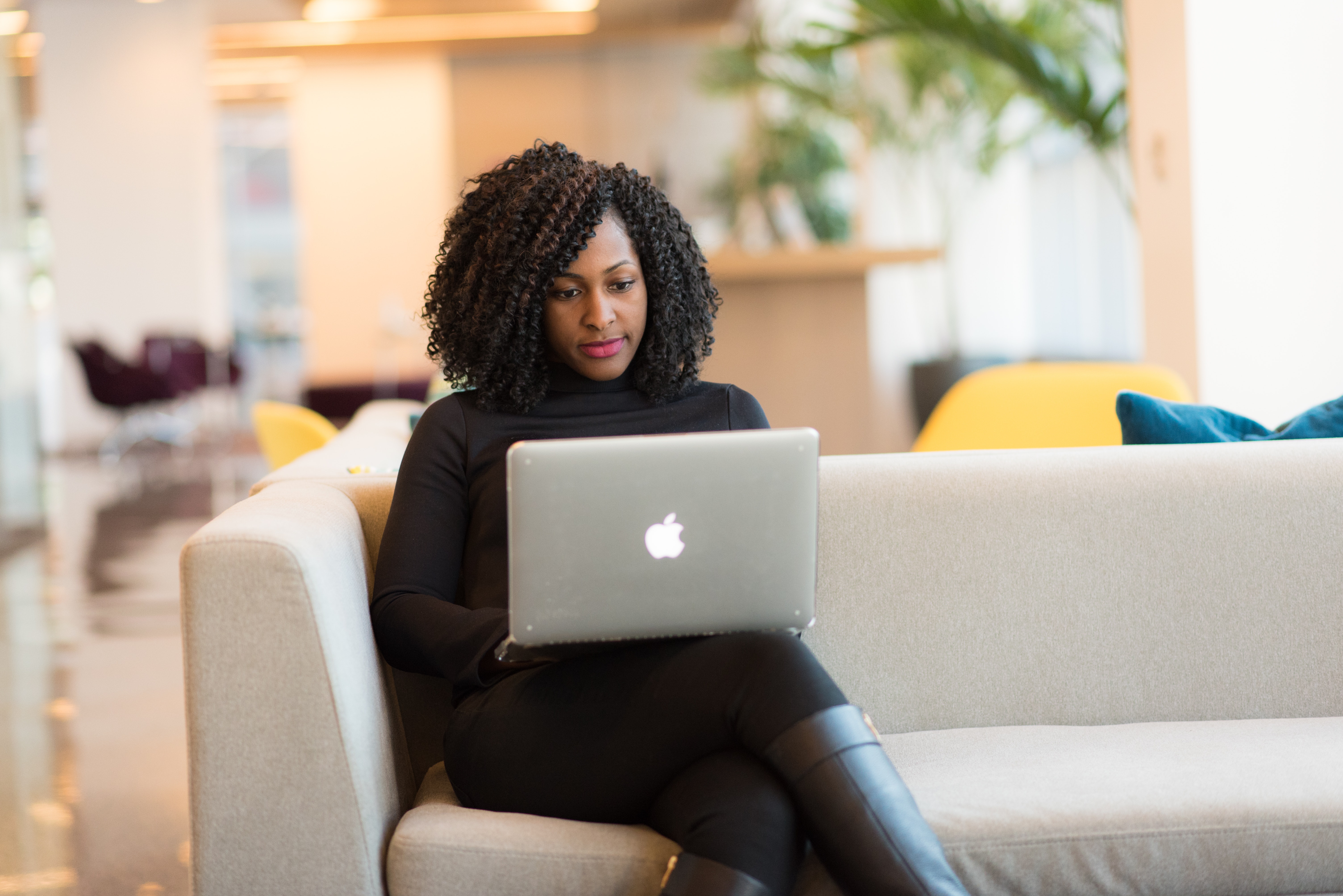 black woman doing recovery e-course